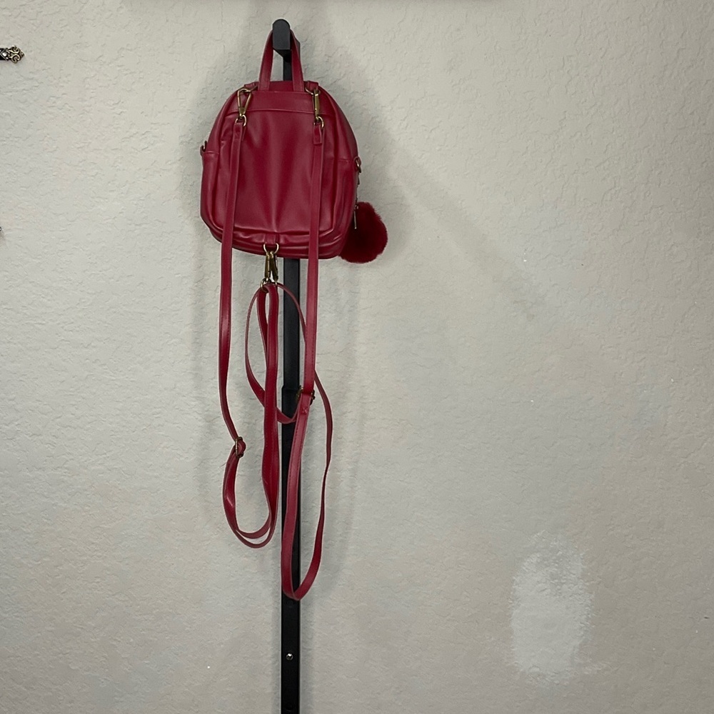 Elegant Red Backpack with Pom Pom Charm - Picture 4 of 4